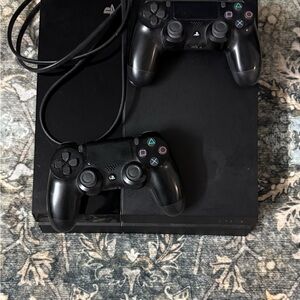 Sony PlayStation Console with DualShock Controllers - Black